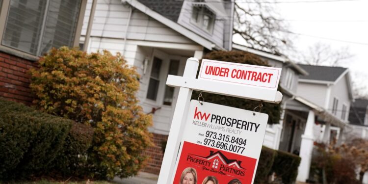 Sign showing a house under contract.