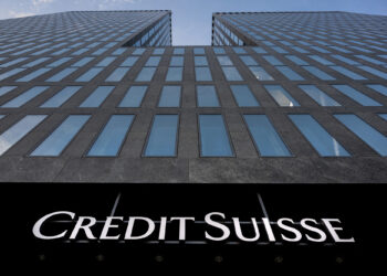 Credit Suisse shares hit record low amid market turmoil