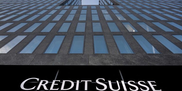 Credit Suisse shares hit record low amid market turmoil