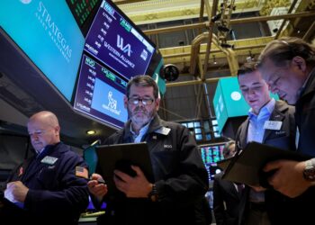 Traders work on the floor of the New York Stock Exchange on Tuesday.