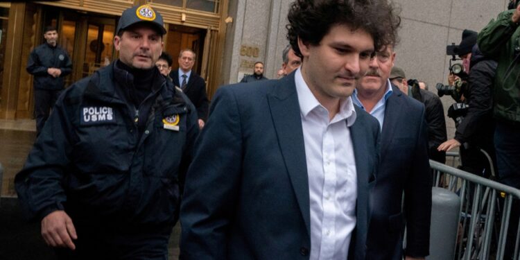Bankman-Fried departs from his court hearing after he was brought in on fraud charges over the collapse of the bankrupt cryptocurrency exchange at Manhattan federal court in New York City, on Jan. 3, 2023.