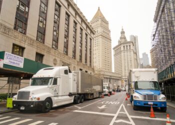 Film production trucks set up in Manhattan on March 25, 2023.