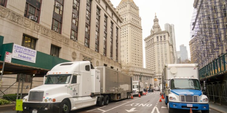 Film production trucks set up in Manhattan on March 25, 2023.