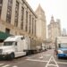 Film production trucks set up in Manhattan on March 25, 2023.