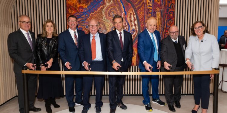 Rupert Murdoch and son Lachlan Murdoch (center) are joined by dignitaries that included Caroline Kennedy (2nd from left), the US ambassador to Australia.