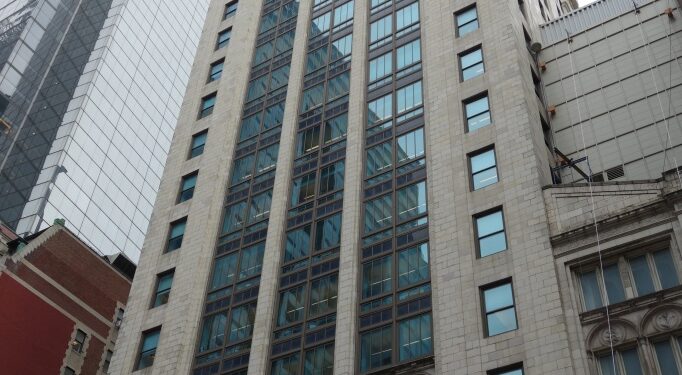 Work to restore the long-dark Times Square Theater at 215 W. 42nd St. ground to a halt.