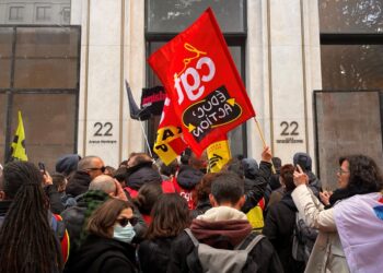 French rail workers enter LVHM headquarters.