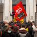 French rail workers enter LVHM headquarters.