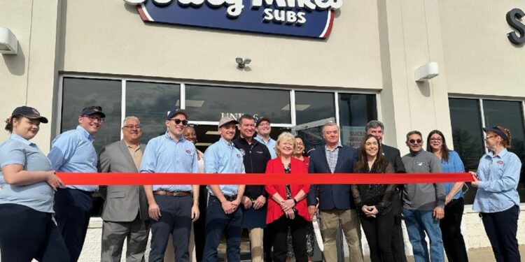 The Ballards at the opening of their store.
