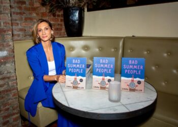 Emma Rosenblum with copies of her new book, "Bad Summer People."