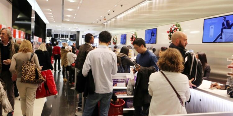 Customers waiting to check out at Century 21.