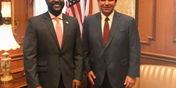 DeSantis ally Glenn Gilzean (pictured with DeSantis) has been appointed as an administrator on The Central Florida Tourism Oversight District board.