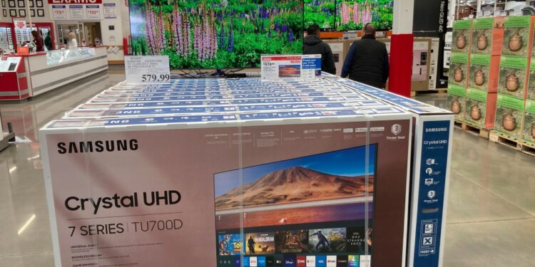 Big-screen televisions in a Costco warehouse