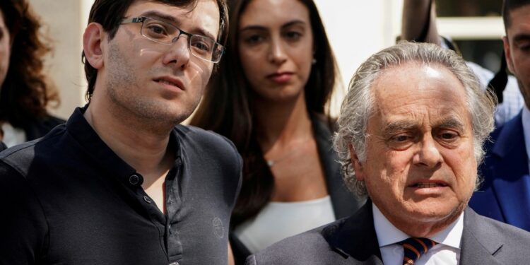 Former drug company executive Martin Shkreli stands with his attorney Benjamin Brafman after exiting U.S. District Court upon being convicted of securities fraud, in the Brooklyn borough of New York City, U.S., August 4, 2017.