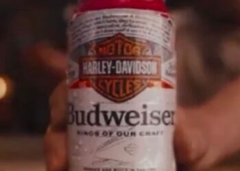 Anheuser-Busch is being accused of pandering to conservatives who have boycotted Bud Light by releasing a new Harley-Davidson-themed commercial for sister brand Budweiser.