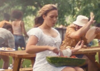 Bud Light's newest commercial features a woman eating watermelon at a picnic.