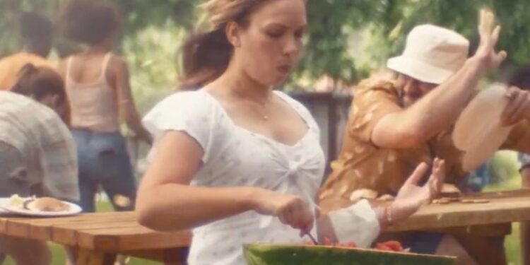 Bud Light's newest commercial features a woman eating watermelon at a picnic.