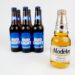 A Modelo Especial bottle in front of six Bud Light bottles.