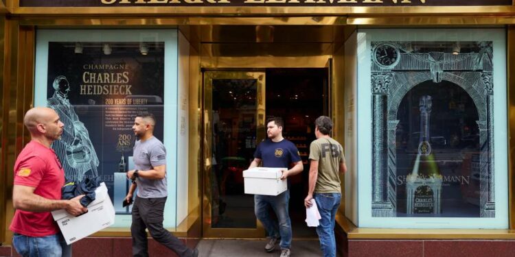 FBI agents taking out boxes at Sherry-Lehmann.