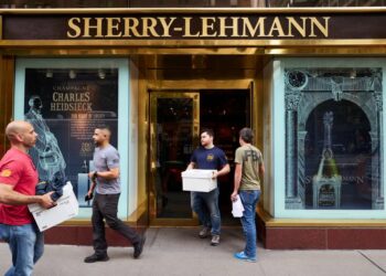 Agents were seen carrying out boxes from the premises.