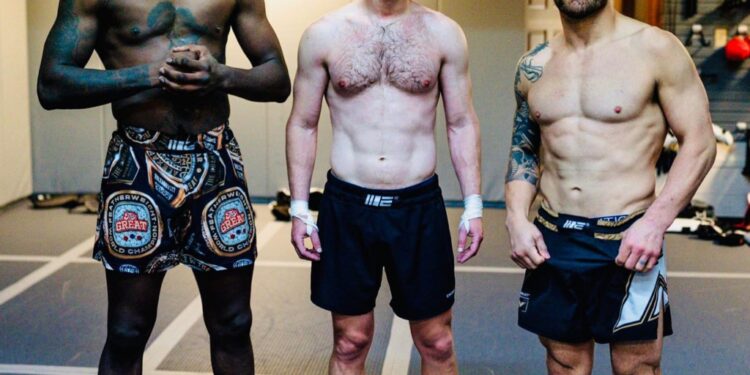 Mark Zuckerberg, 39, flexed his six-pack abs alongside UFC champs Israel Adesanya (left) and Alex Volkanovski (right) in an Instagram photo posted on Tuesday.