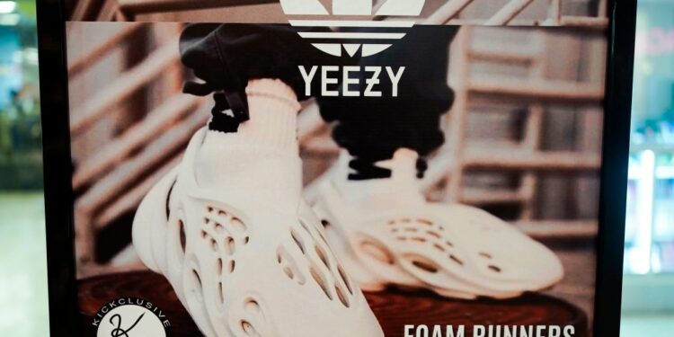 A sign advertises Yeezy shoes