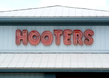 A North Carolina Hooters location is facing a lawsuit for allegedly discriminating against employees with "dark skin tones."