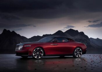 The Rolls-Royce La Rose Noire Droptail debuted on Monday with a yacht-inspired, low-slung construction, custom Audemars Piguet watch mounted to the dashboard and a champagne storage compartment for $30 million.