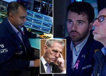 Dow tumbles into the red for the year after unexpected jobs data, Washington chaos