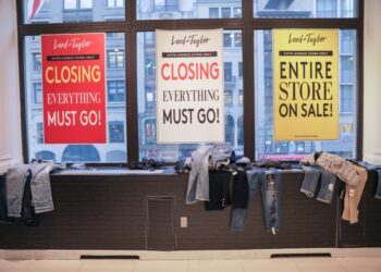 Going out of business signs in Lord & Taylor windows.