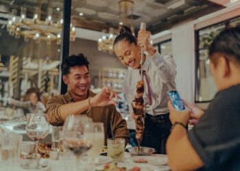 Fogo de Chao customers and waitress