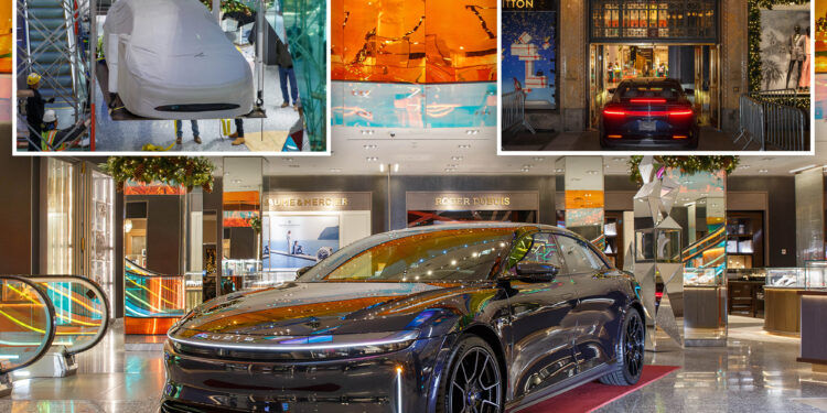 Saks Fifth Avenue lowers $250K electric car into jewelry section