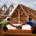 Carpenters work on a home