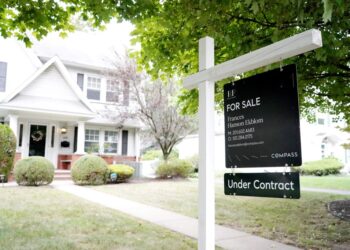 Compass Real Estate 'House Under Contract' sign posted in front of a house in Hawthorne, NJ