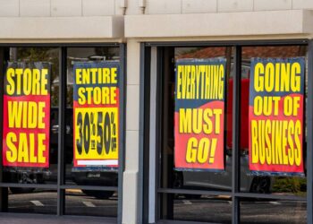 Badcock Home Furniture store on North Florida Avenue in Lakeland, Florida, with closing signs on the windows. July 26.