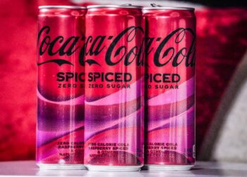 Cans of Coca-Cola Spiced being unveiled at a livestream media event in New York on February 6, 2024