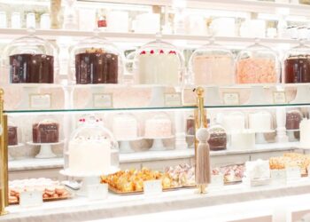 The Cake Bake Shop by Gwendolyn Rogers at Disney's BoardWalk in Orlando, displaying a variety of cakes and pastries