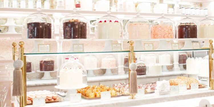 The Cake Bake Shop by Gwendolyn Rogers at Disney's BoardWalk in Orlando, displaying a variety of cakes and pastries