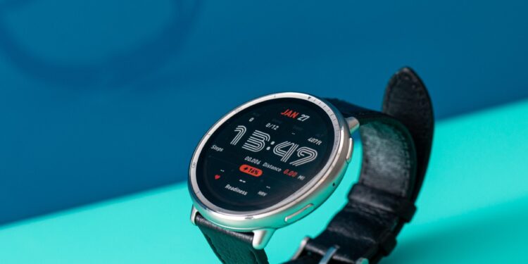 Angled view of the Amazfit Active 2 showing a stylish retro watch face against a bright blue background