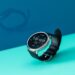 Angled view of the Amazfit Active 2 showing a stylish retro watch face against a bright blue background