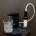A double-tap of the Dometic Go faucet produces clean drinking water from the LifeStraw filter snapped into the Go jug.