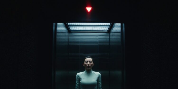 A photo of Dichen Lachman in Severance.