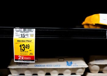 Egg shelf with $13.49 price tag.