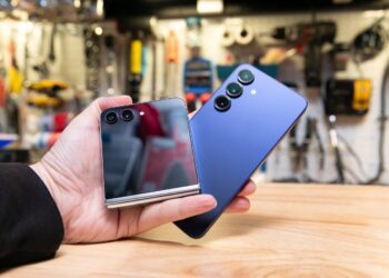 My Z Flip 5, folded, next to the normal-sized Galaxy S25.