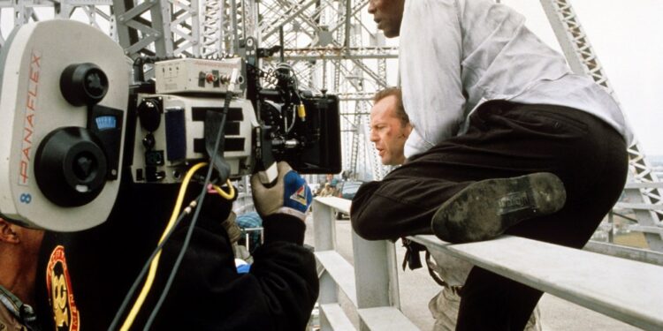 DIE HARD: WITH A VENGEANCE, from left: Bruce Willis, Samuel L. Jackson filming on location, 1995, TM and Copyright ©20th Century Fox Film Corp.