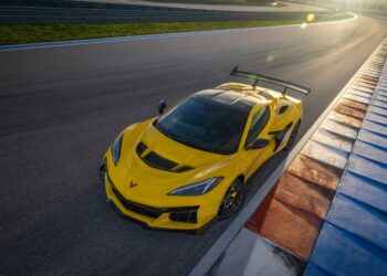 Front aerial shot of the Chevrolet Corvette ZR1 coupe in Competition Yellow with optional ZTK Performance Package on the race track. Preproduction model shown. Actual production model may vary.
