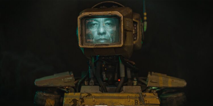 A humanoid robot with a monitor for a head displaying an actual human face.