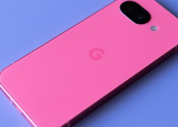 Google Pixel 9A in peony pink on a purple background.