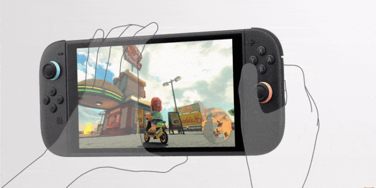 Animation showing translucent hands detaching Joy-Con 2s.