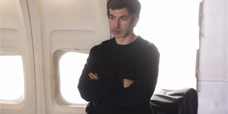 Nathan Fielder, a man in a black shirt with arms crossed